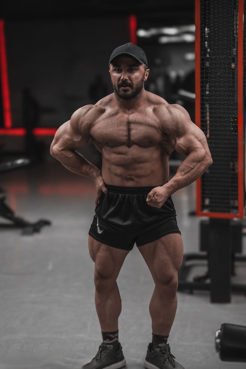 Close view of a bodybuilder’s left deltoid, with visible separation from the chest and upper-arm muscles